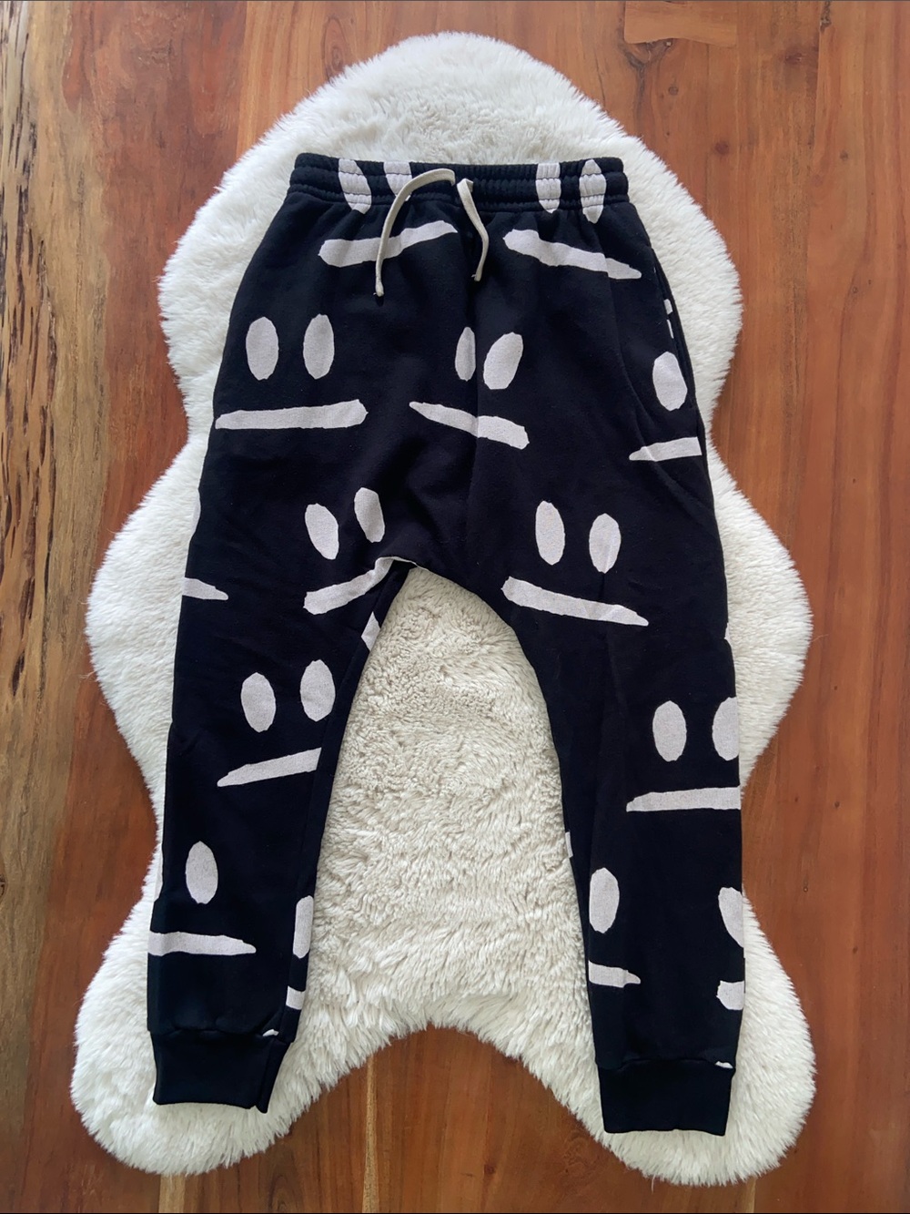 Nununu black baggy pants face print drop crotch jogger sweats unisex boys 10/11